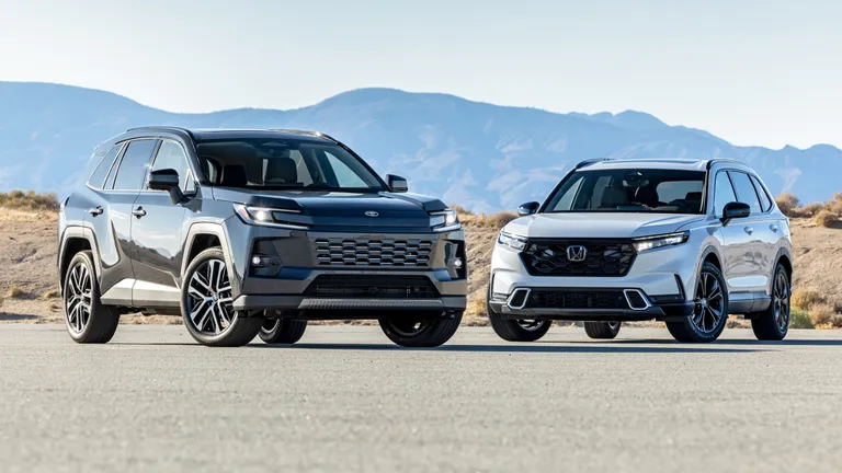 2026 Honda CR-V Hybrid Sport Touring vs Toyota RAV4 comparison hero image