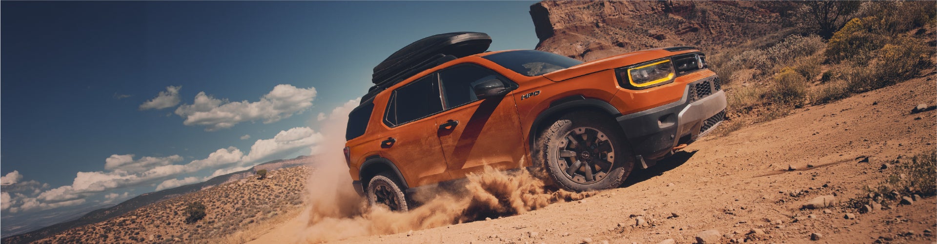 Orange Honda SUV